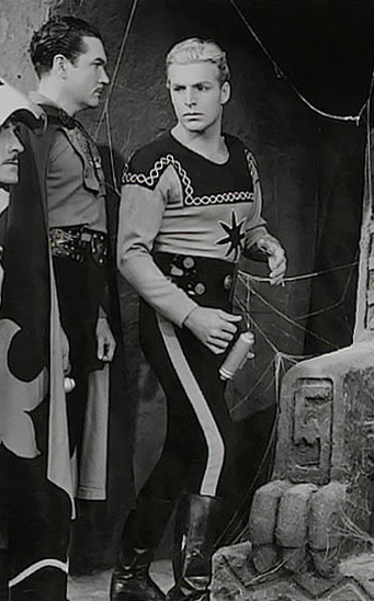 Buster Crabbe as Flash Gordon wearing a shirt with a star symbol in the 1940 serial "Flash Gordon Conquers the Universe."
