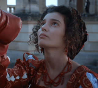 Gaia Girace as Catherine de Médicis wearing a set of coral jewelry in the 2022 miniseries "Diane de Poitiers (The King's Favorite)."