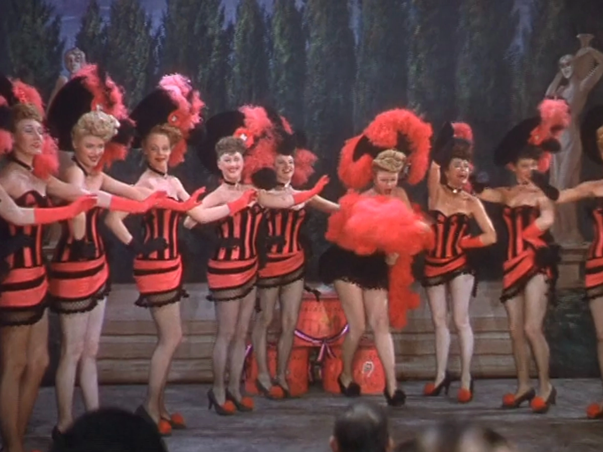 Extras as showgirls wearing black and red striped showgirl costumes in the 1946 film "The Harvey Girls."