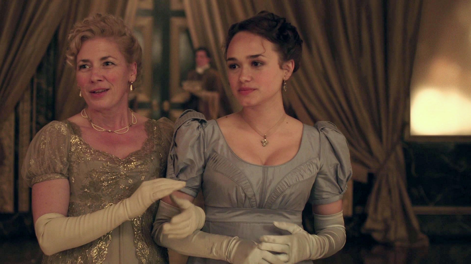 Rose WIlliams as Charlotte Heywood wearing a blue dress in the 2019 series "Sanditon."