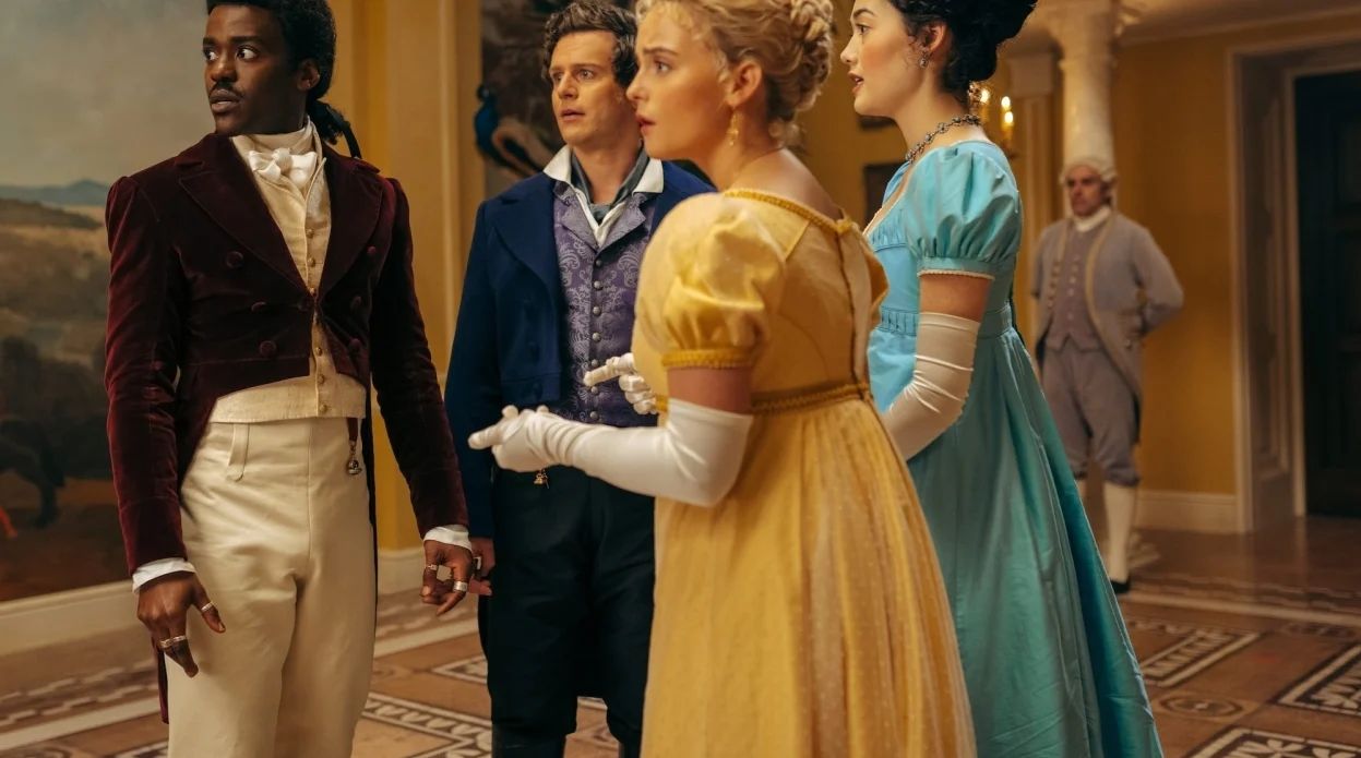 Camilla Aiko as Emily Beckett wearing a blue dress in the episode "Rogue" of the 2024 series "Doctor Who."