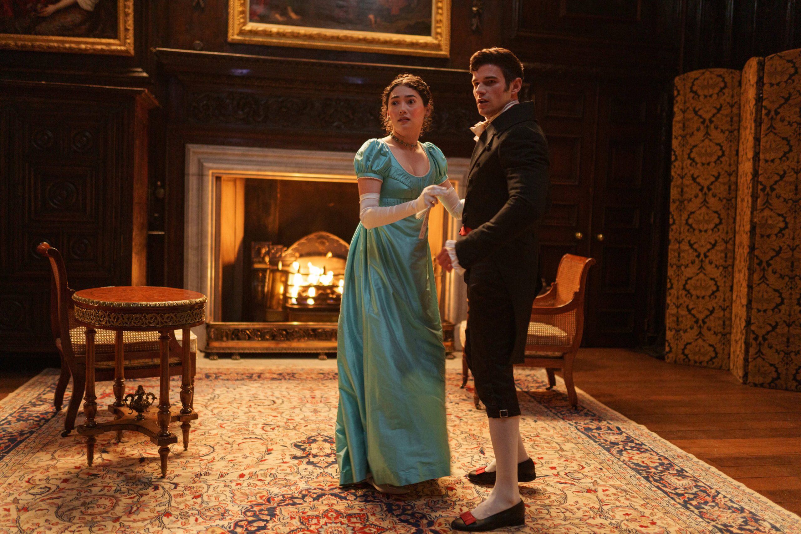 Camilla Aiko as Emily Beckett wearing a blue dress in the episode "Rogue" of the 2024 series "Doctor Who."