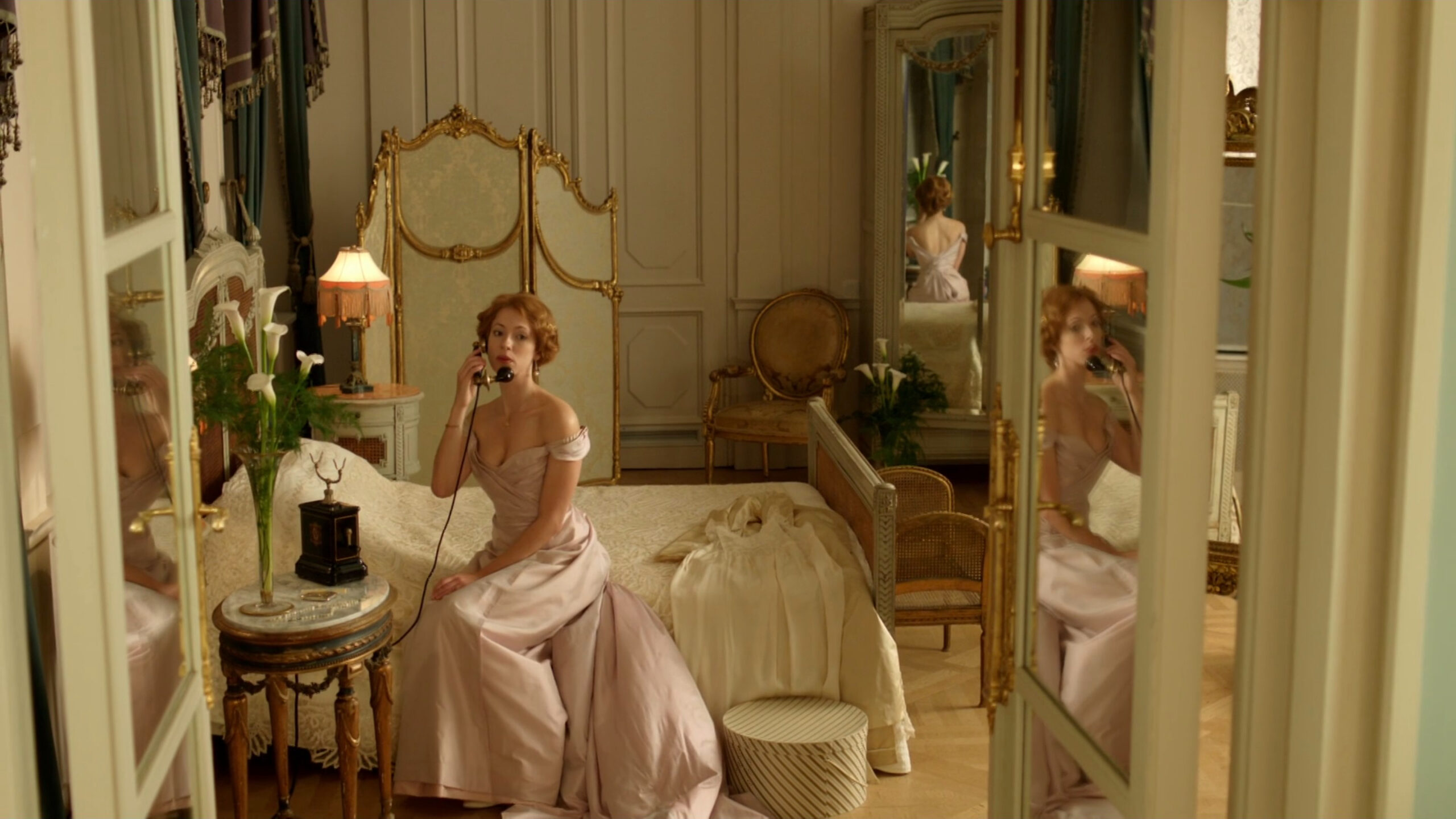 Rebecca Hall as Sylvia Tietjens wearing a pale blush pink gown in the 2012 mini-series "Parade's End."